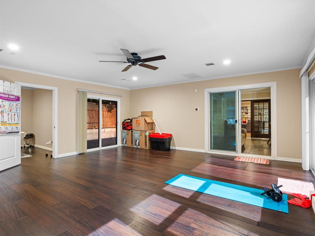 1318 Brook Valley Lane Dallas, TX 75232 - Photo 19 of 39 a living room with furniture and wooden floor