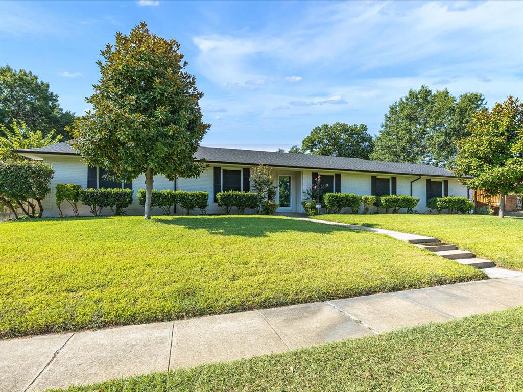 1318 Brook Valley Lane Dallas, TX 75232 - Photo 2 of 39 a house with swimming pool in front of it
