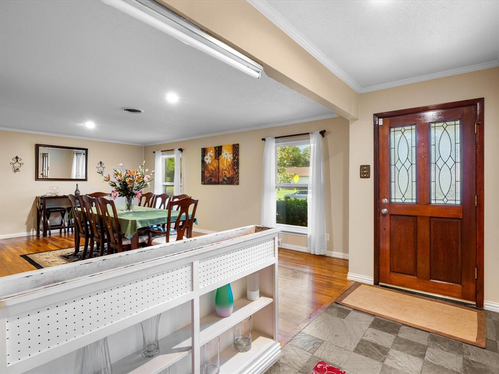 1318 Brook Valley Lane Dallas, TX 75232 - Photo 3 of 39 a view of a living room and dining room