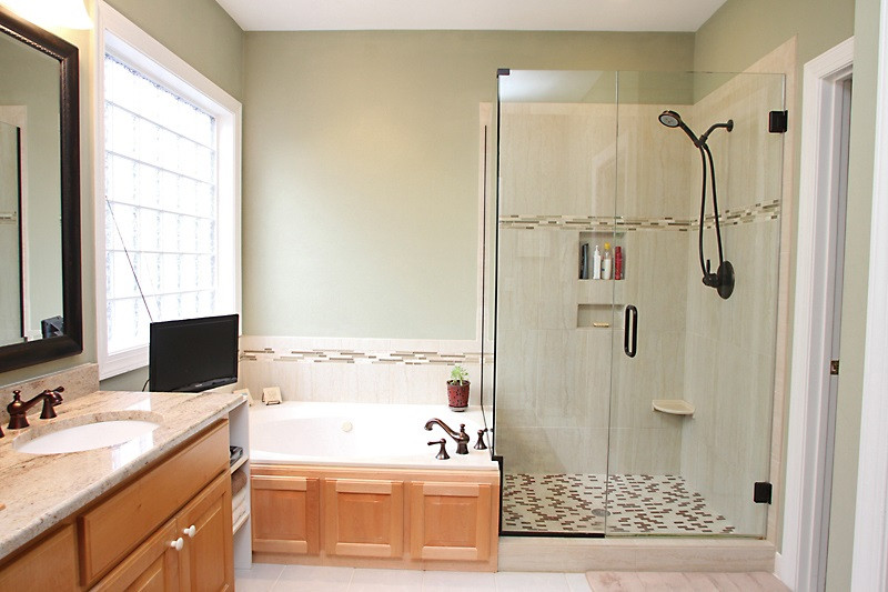 1300 Merrington Circle Raleigh, NC 27615 - Photo 9 of 25 Newly Renovated Master Bathroom. Spectacular Glass and Tile Shower & Soaker Tub. A True Retreat Spa. Master Bathroom