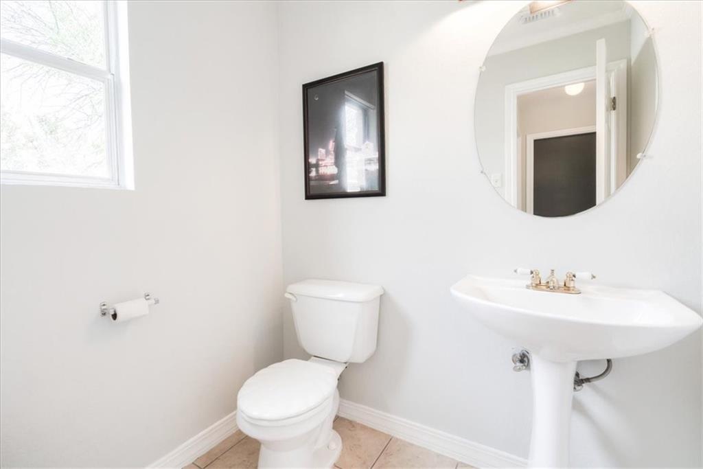 20805 Jumpers Delight Lane Pflugerville, TX 78660 - Photo 12 of 24 Bathroom featuring toilet and light tile patterned floors