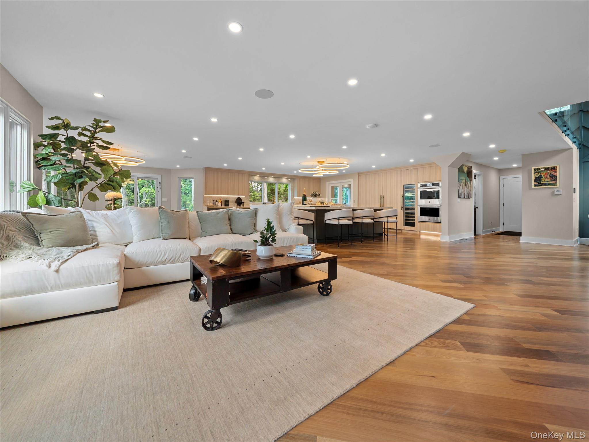 5 North Hills Road East Norwich, NY 11732 - Photo 12 of 50 a living room with furniture and a couch