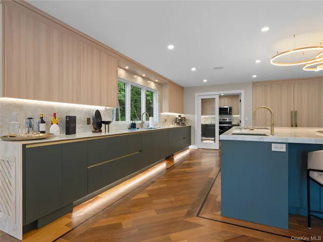 a kitchen with lots of counter top space and appliances