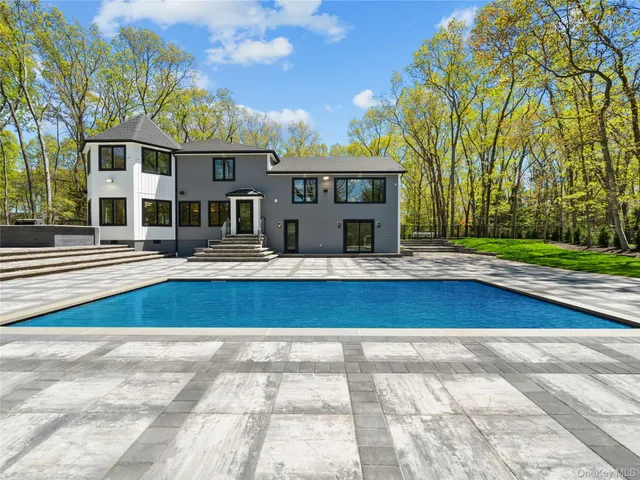 a front view of residential houses with yard