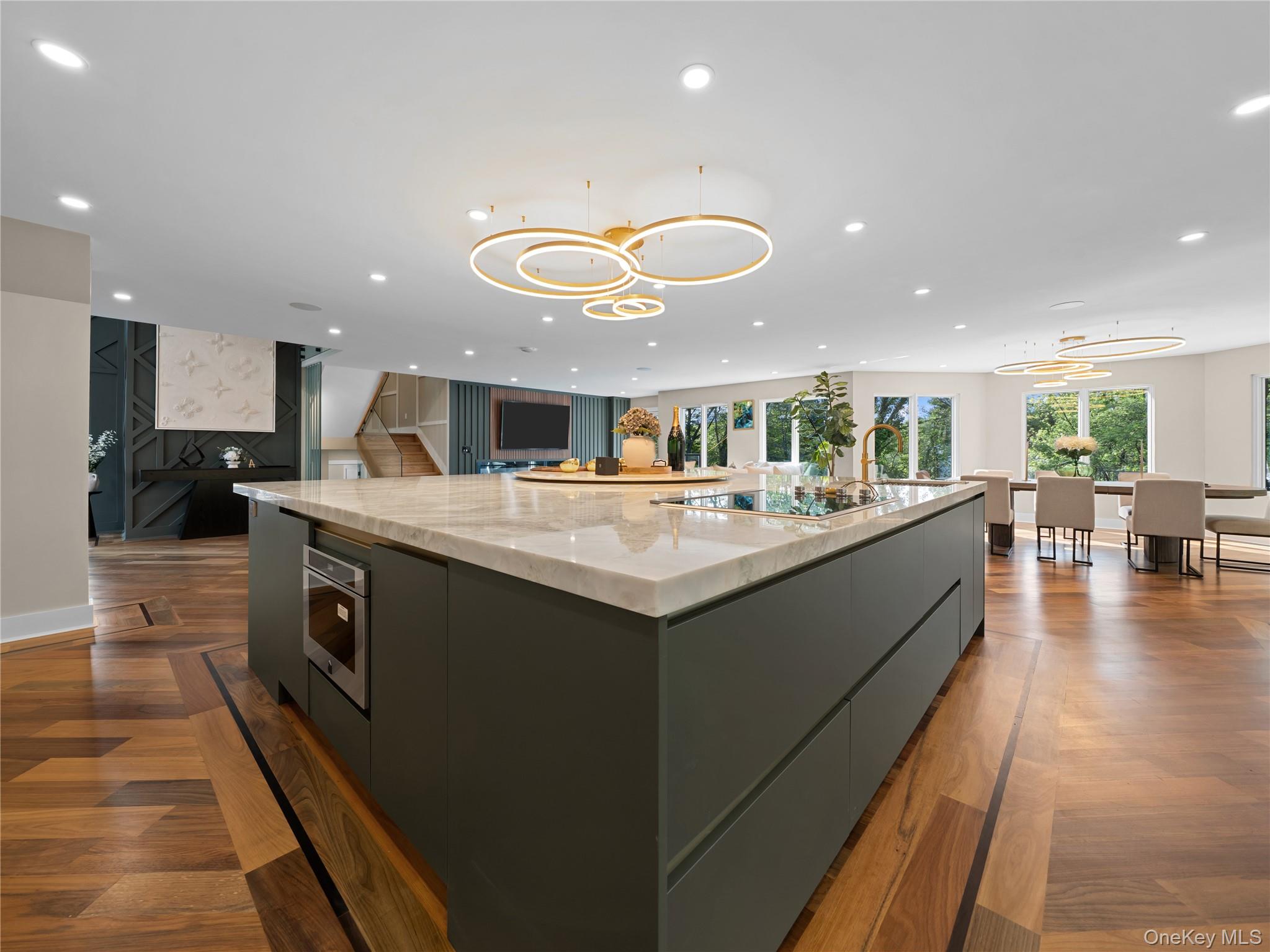 5 North Hills Road East Norwich, NY 11732 - Photo 50 of 50 a kitchen with stainless steel appliances granite countertop a sink and cabinets