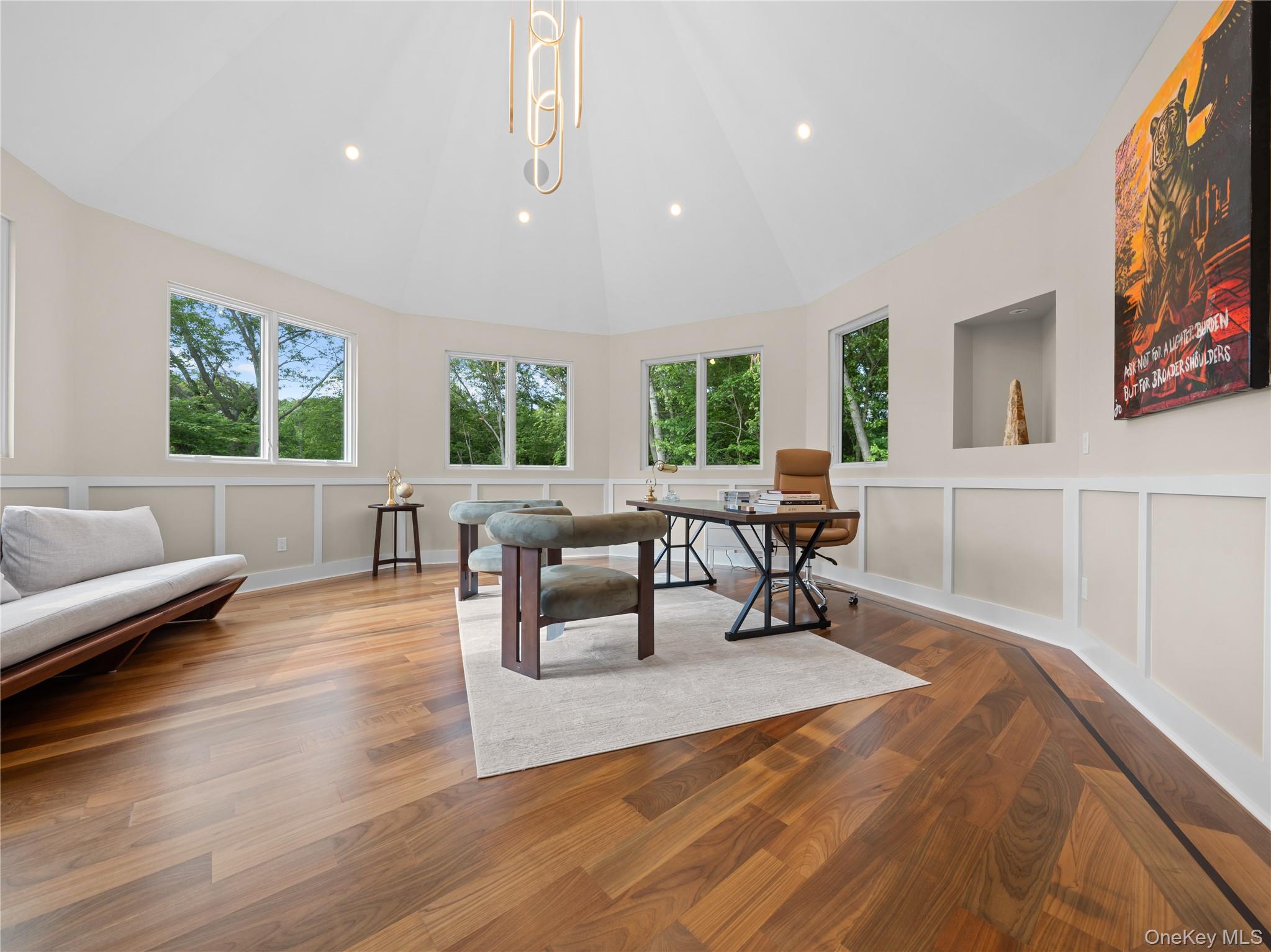 5 North Hills Road East Norwich, NY 11732 - Photo 38 of 50 a living room with furniture and large windows