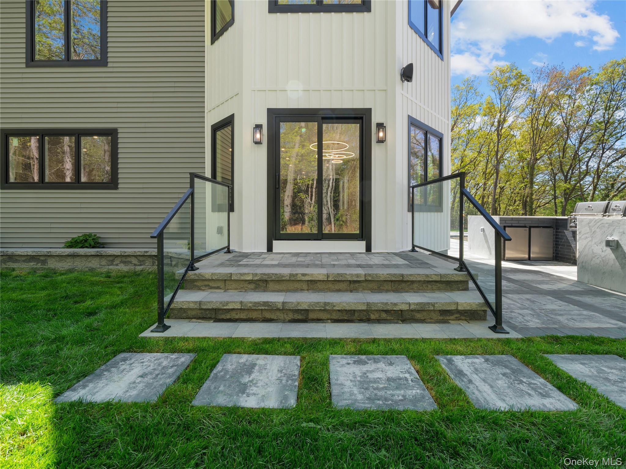 5 North Hills Road East Norwich, NY 11732 - Photo 6 of 50 a view of a house with a yard