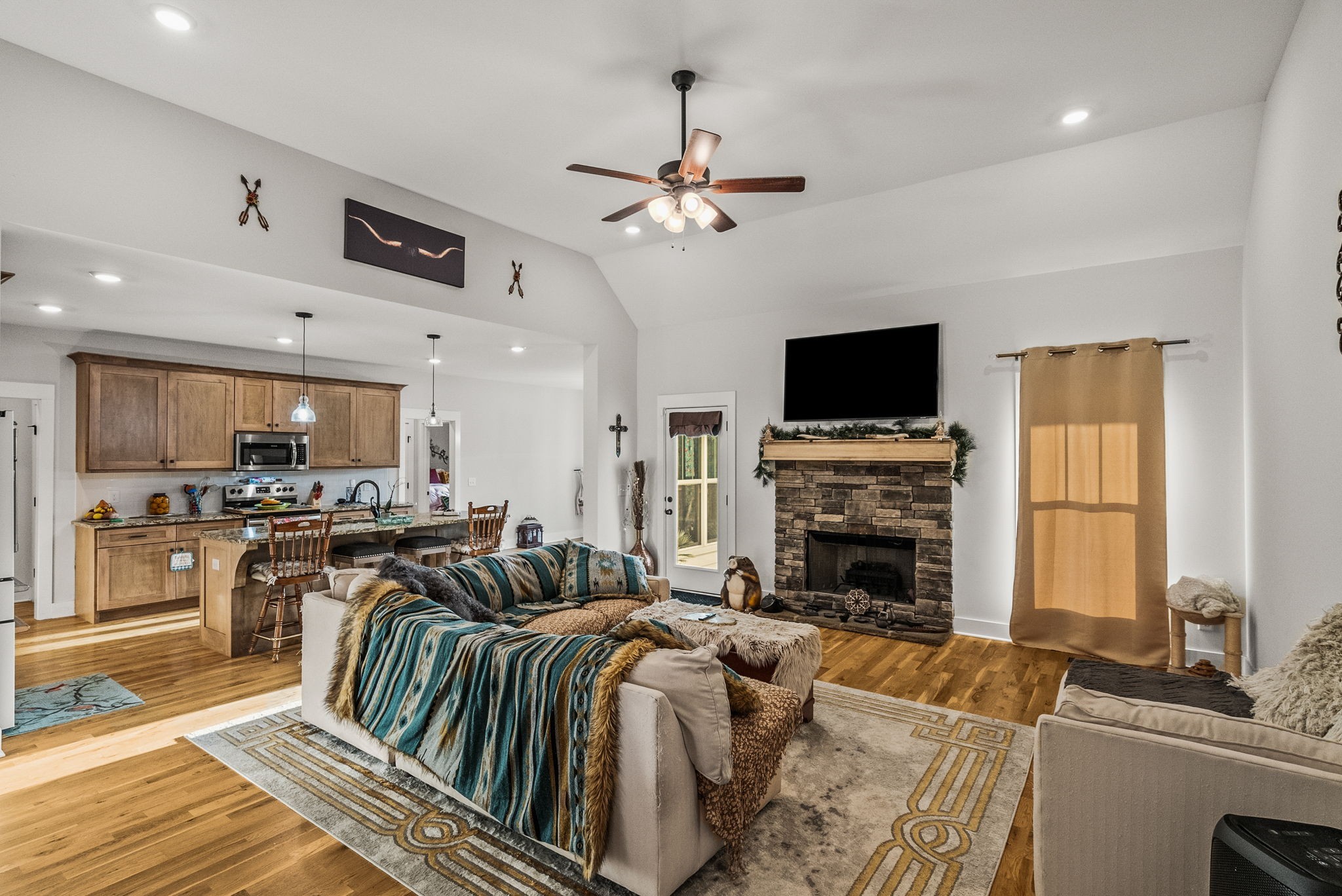 3378 New Hall Road Greenbrier, TN 37073 - Photo 21 of 83 a living room with fireplace furniture and a flat screen tv
