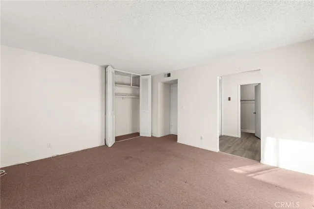 a bathroom with a sink a mirror and a window