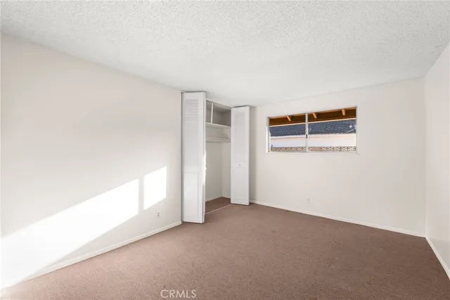 a house view with a sitting space and garden space