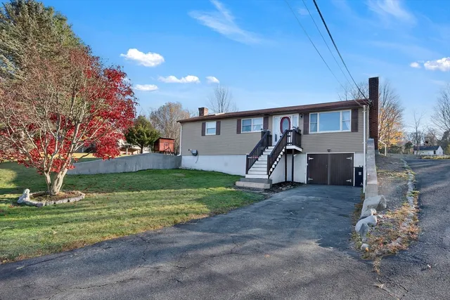 a house view with a garden space