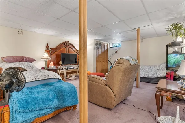 a living room with a couch and a flat screen tv