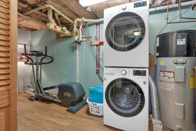 a view of a storage and utility room with washer and dryer