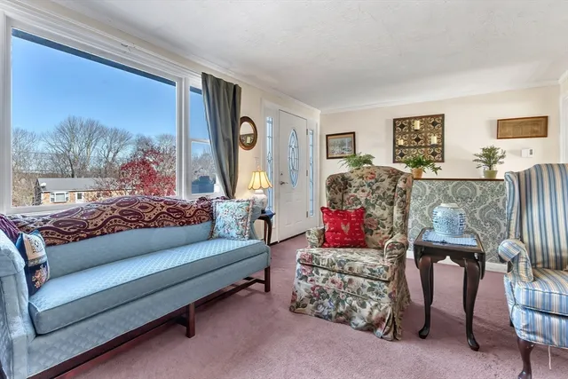 a living room with furniture and a couch