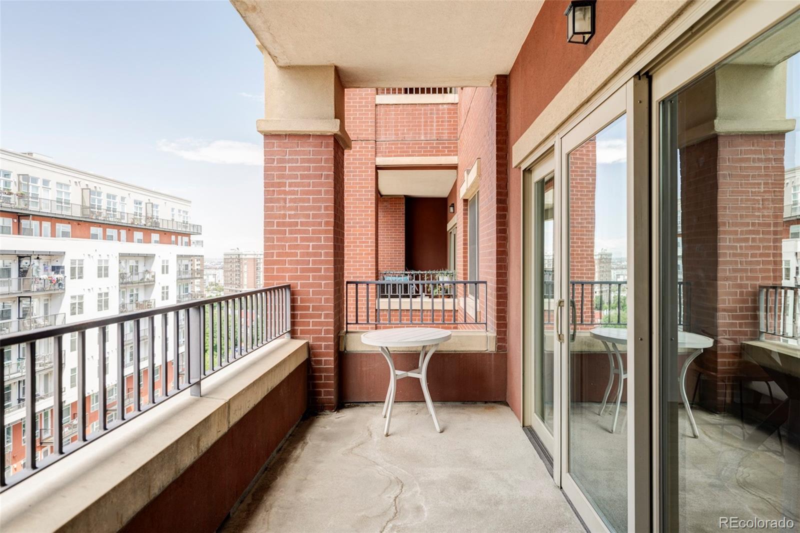 1950 Logan Street, Unit 1013 Denver, CO 80203 - Photo 16 of 23 a balcony view with a outdoor seating space