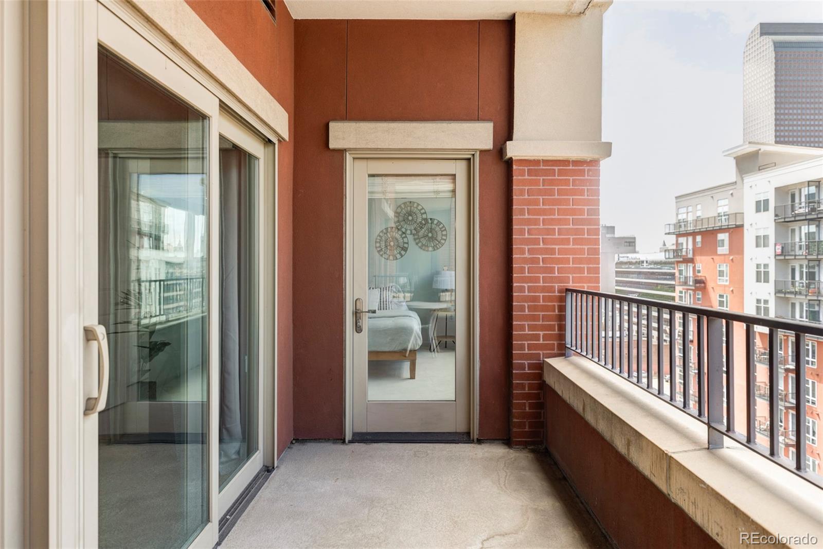 1950 Logan Street, Unit 1013 Denver, CO 80203 - Photo 17 of 23 a view of balcony with a porch