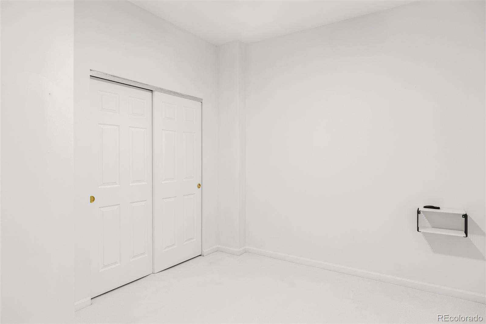 1950 Logan Street, Unit 1013 Denver, CO 80203 - Photo 22 of 23 a view of a closet area
