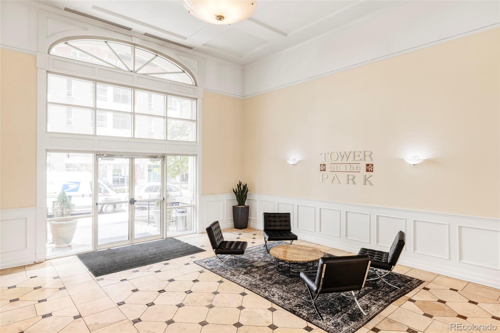1950 Logan Street, Unit 1013 Denver, CO 80203 - Photo 23 of 23 a living room with furniture and a large window
