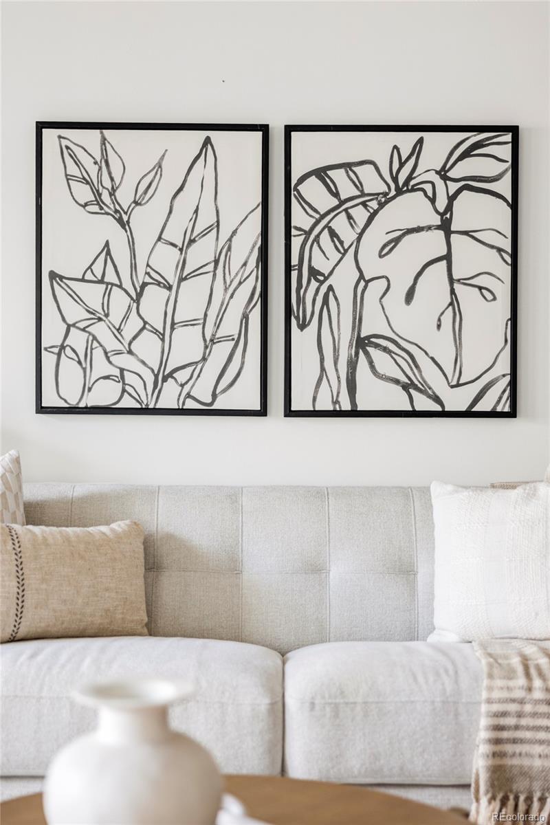 1950 Logan Street, Unit 1013 Denver, CO 80203 - Photo 8 of 23 a living room with couch