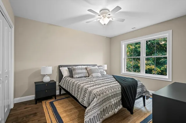 a bathroom with a double vanity sink and mirror