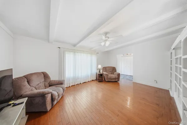 a view of livingroom with furniture and wooden floor