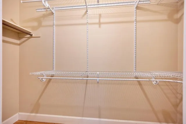 a view of a room with racks on the wall