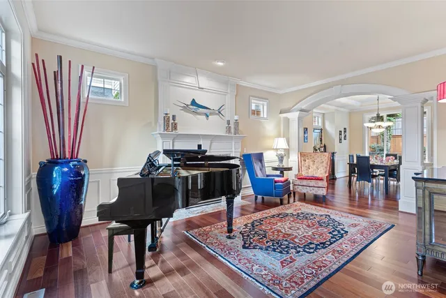 a living room with furniture and a rug