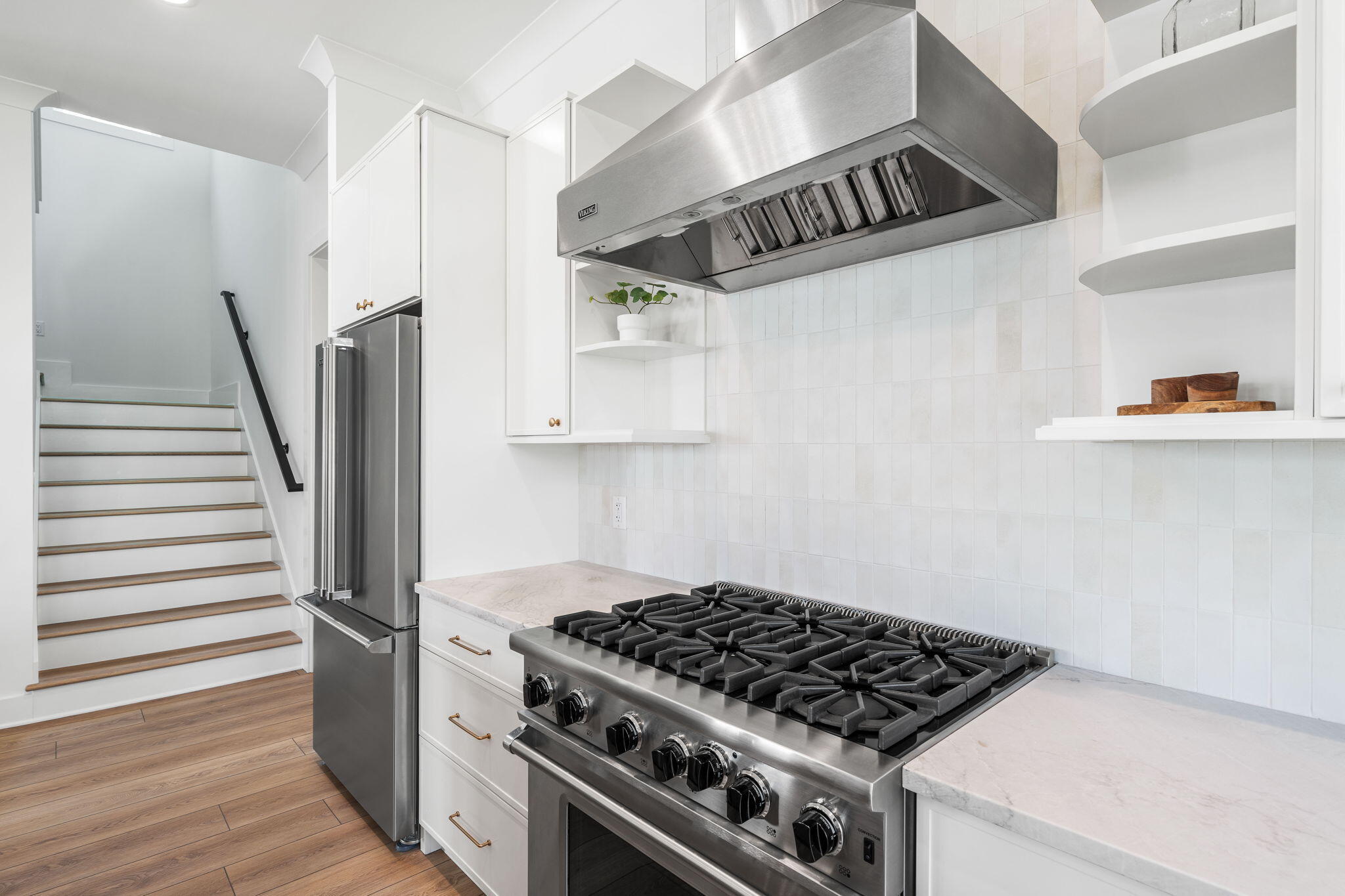 181 Plantation Circle Santa Rosa Beach, FL 32459 - Photo 11 of 69 a kitchen with stainless steel appliances granite countertop a stove and a refrigerator