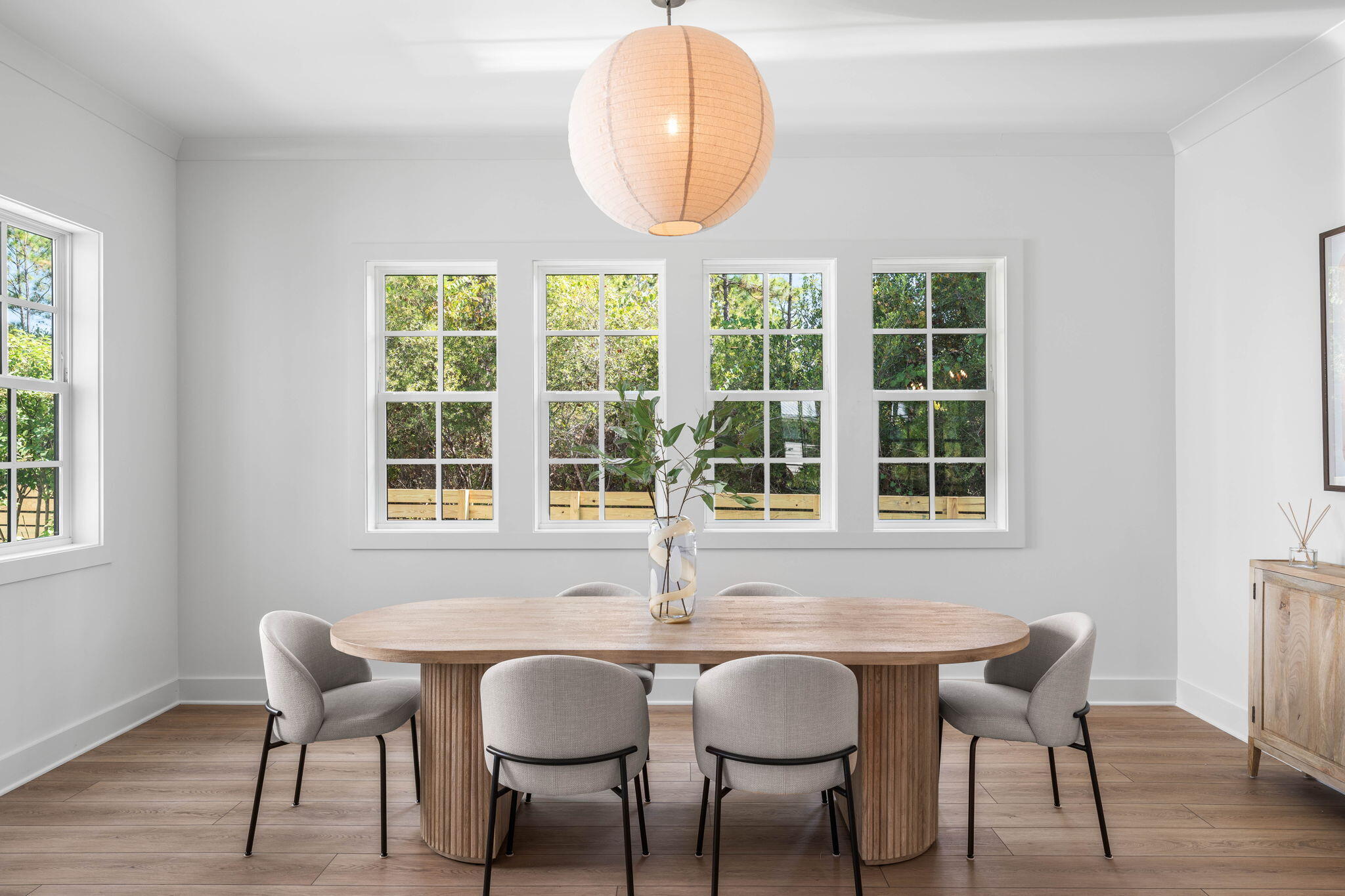 181 Plantation Circle Santa Rosa Beach, FL 32459 - Photo 15 of 69 a view of a dining room with furniture and window