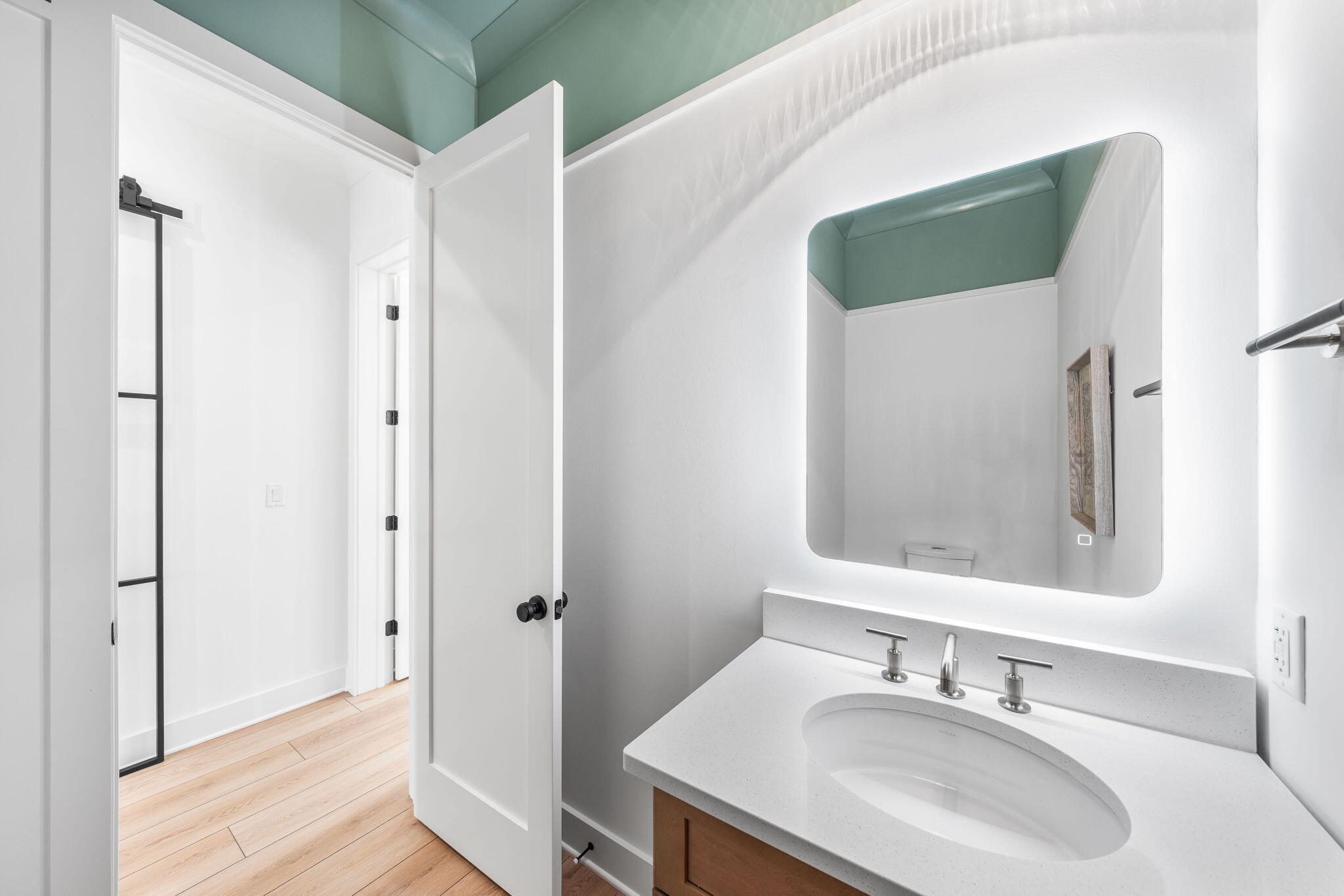 181 Plantation Circle Santa Rosa Beach, FL 32459 - Photo 27 of 69 a bathroom with a sink and a mirror