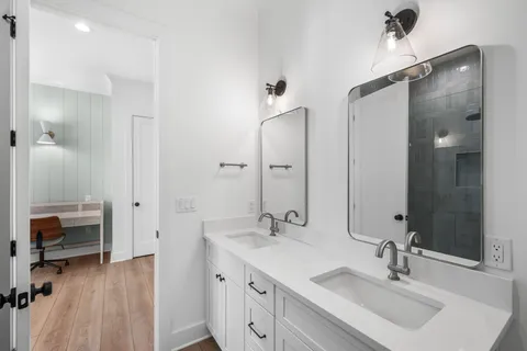 a bathroom with a bathtub and shower