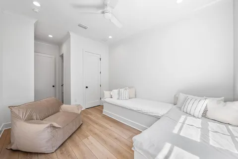 a view of a balcony with wooden floor