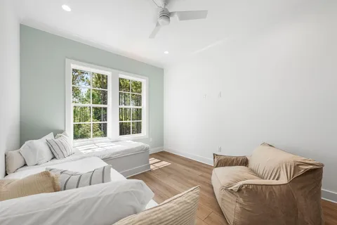 a view of a balcony with wooden floor