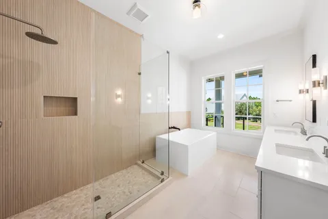 a view of a backyard with wooden fence