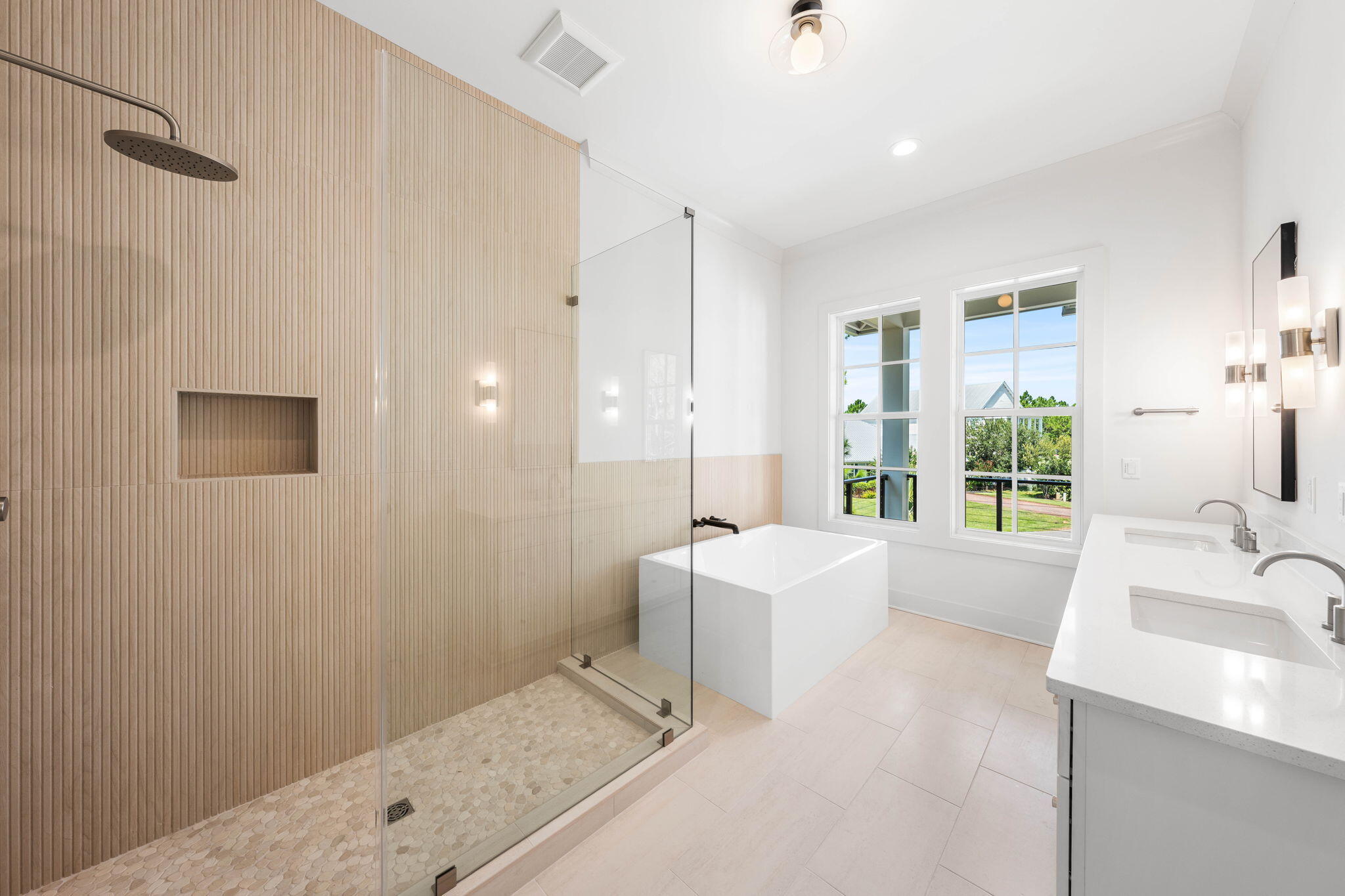 181 Plantation Circle Santa Rosa Beach, FL 32459 - Photo 39 of 69 a spacious bathroom with a tub sink and mirror