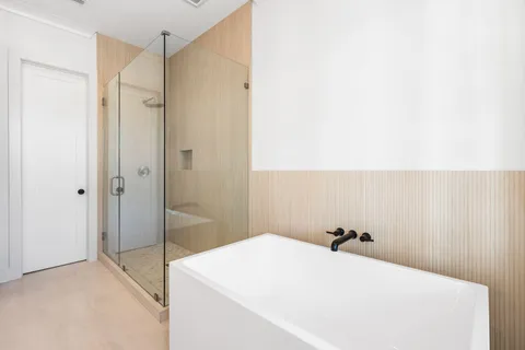 a view of a kitchen with a sink and a stove top oven
