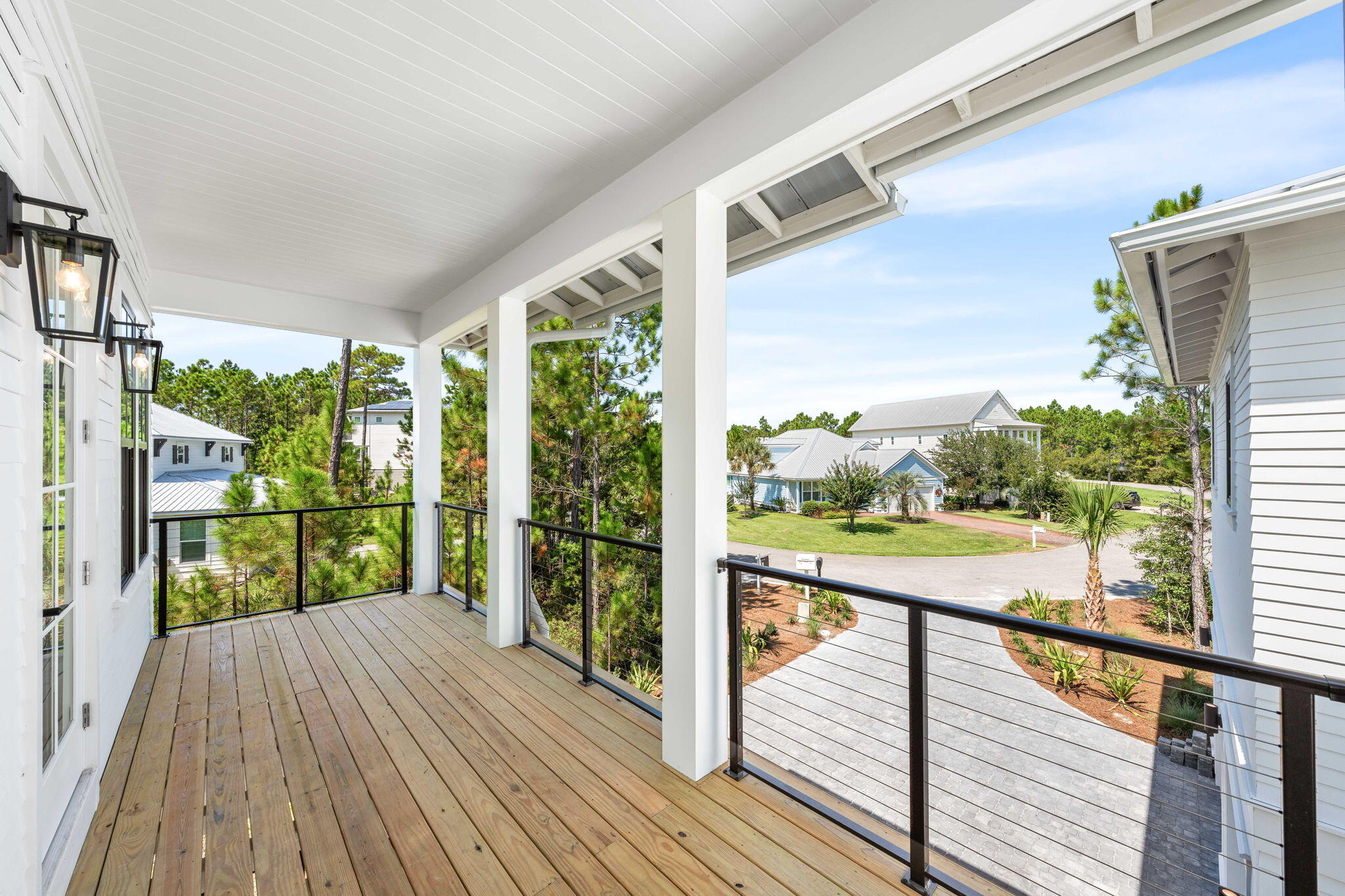 181 Plantation Circle Santa Rosa Beach, FL 32459 - Photo 43 of 69 a view of a balcony with wooden floor
