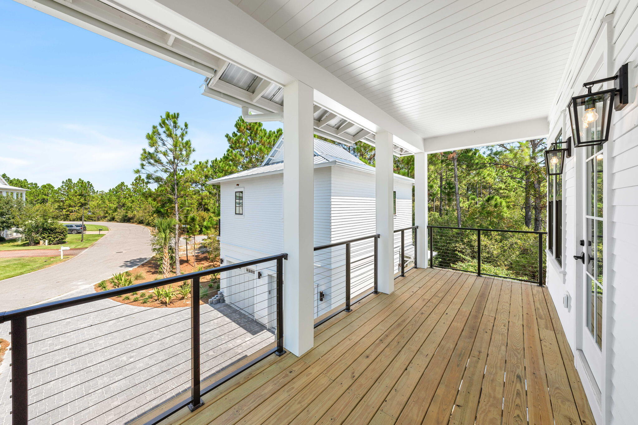 181 Plantation Circle Santa Rosa Beach, FL 32459 - Photo 44 of 69 a view of a balcony with wooden floor