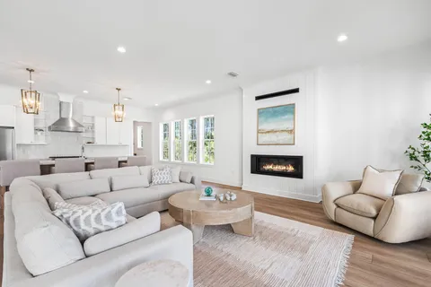 a kitchen with granite countertop a stove and a sink