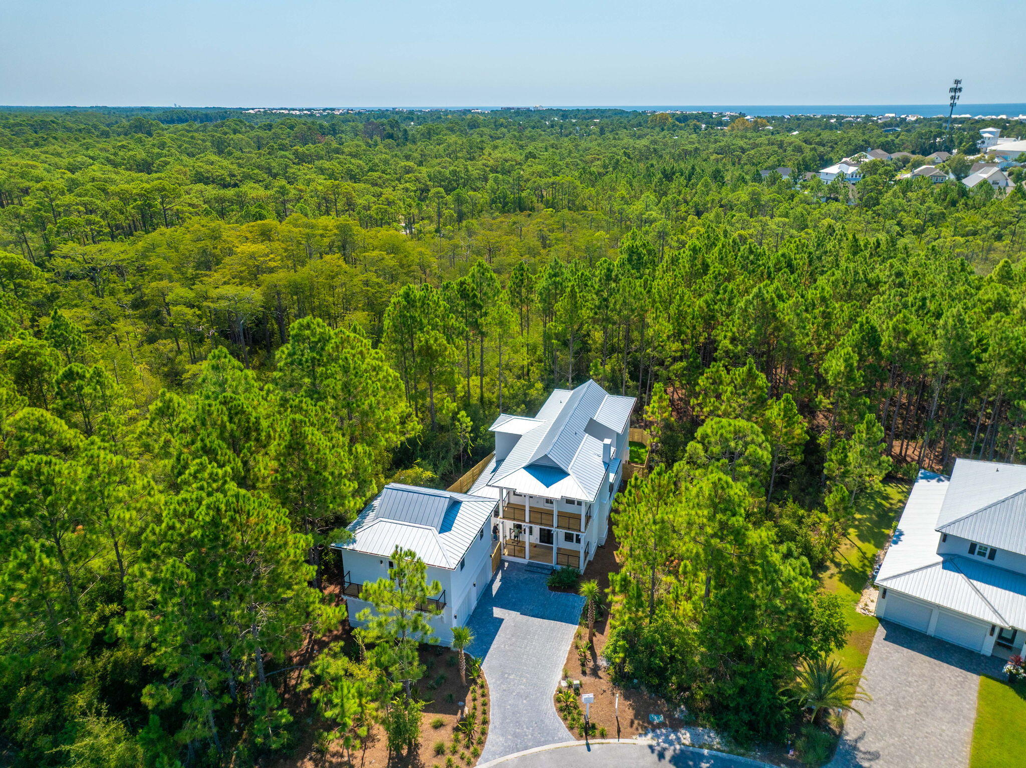 181 Plantation Circle Santa Rosa Beach, FL 32459 - Photo 59 of 69 an aerial view of a house with a yard