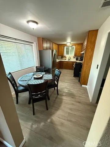 a view of a dining room with furniture