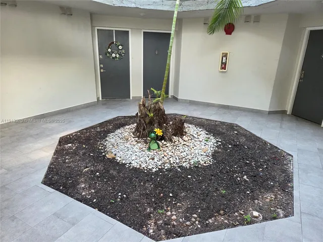 a vase of flowers sitting on a table