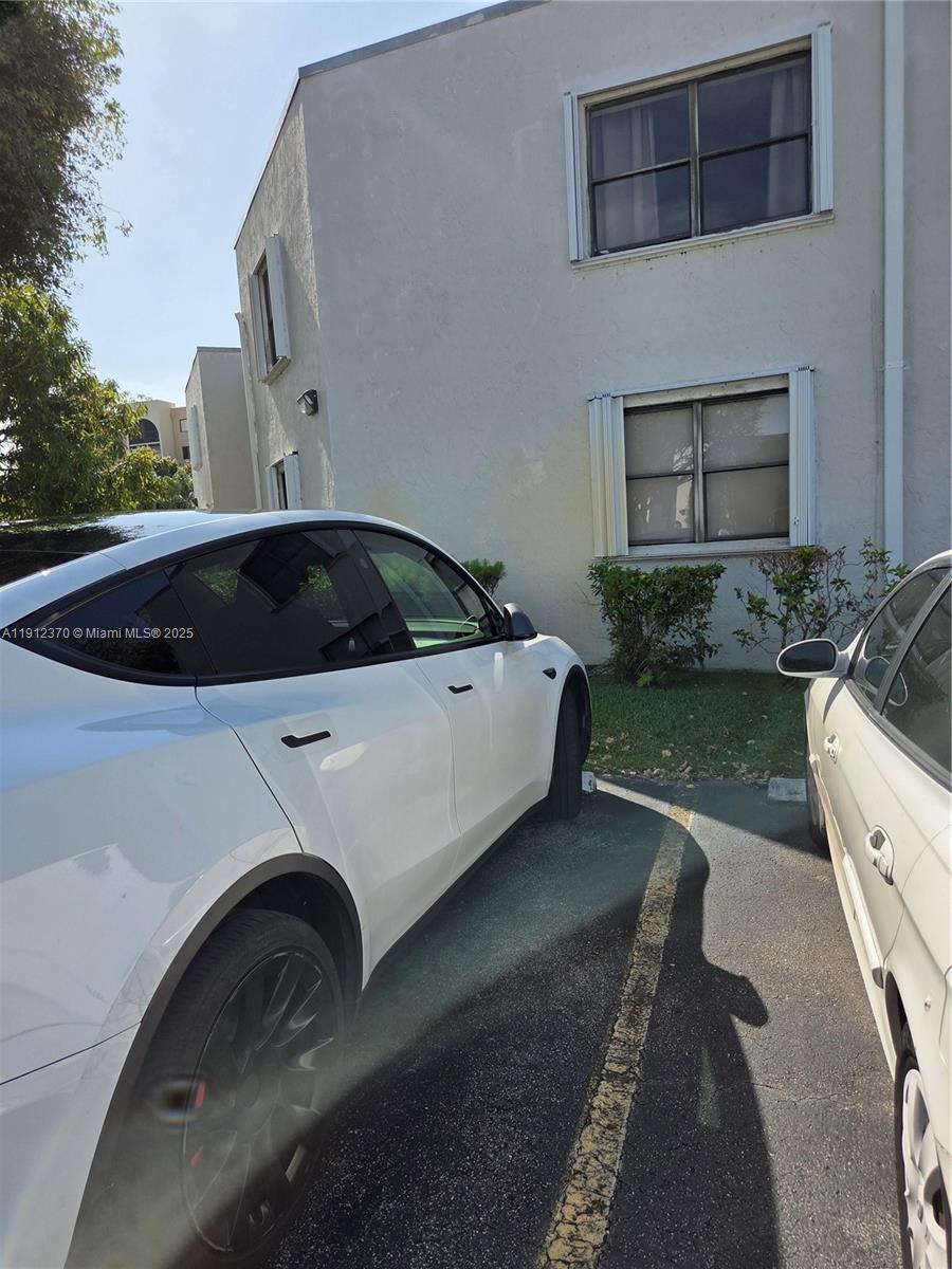 9433 Fontainebleau Boulevard, Unit 212 Miami, FL 33172 - Photo 39 of 45 a view of a couches in patio of a house