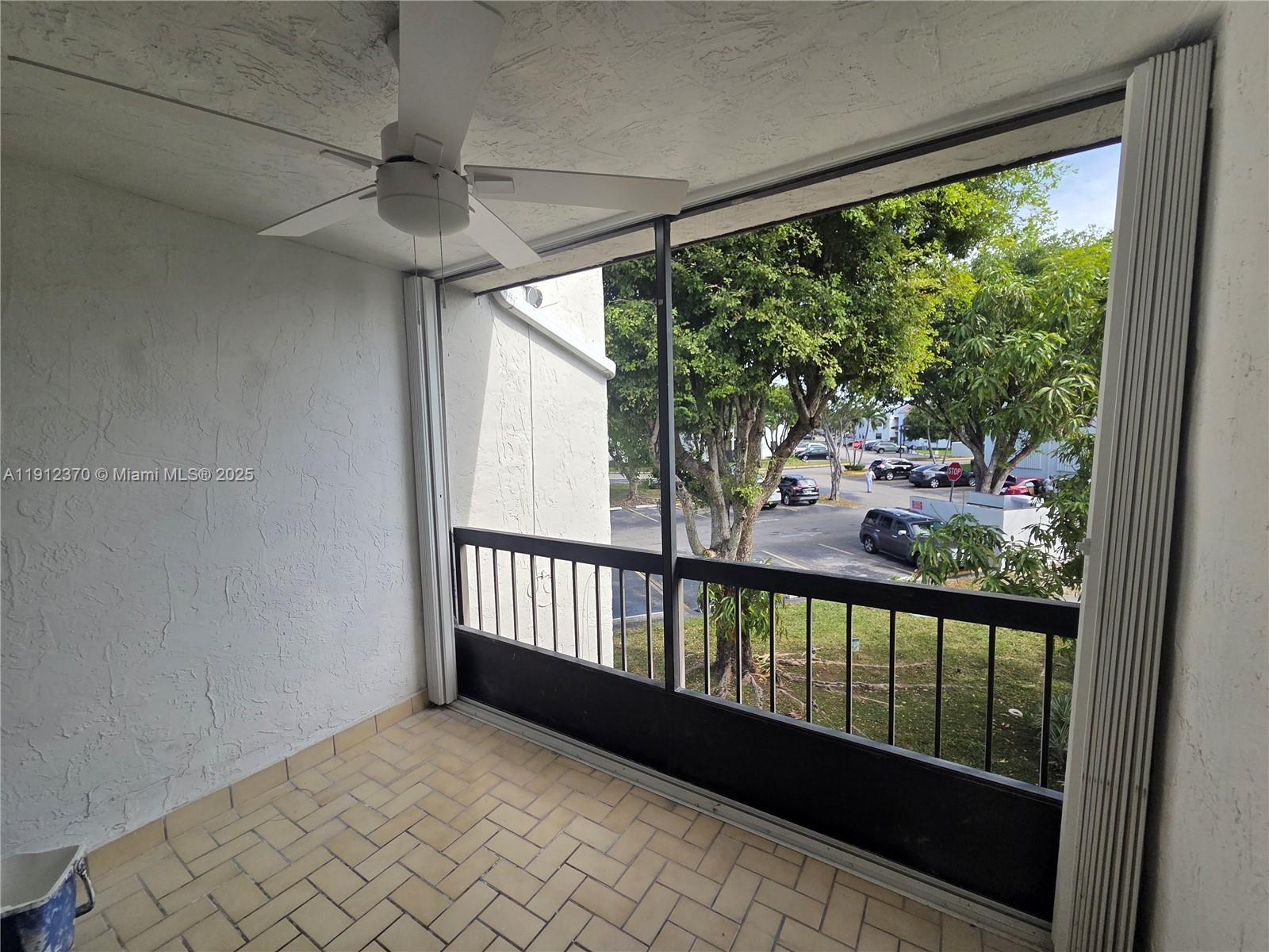 9433 Fontainebleau Boulevard, Unit 212 Miami, FL 33172 - Photo 9 of 45 a view of a porch