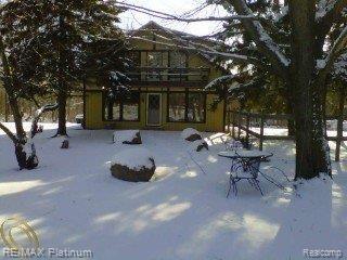 6136 Brophy Road Howell, MI 48855 - Photo 1 of 25 front