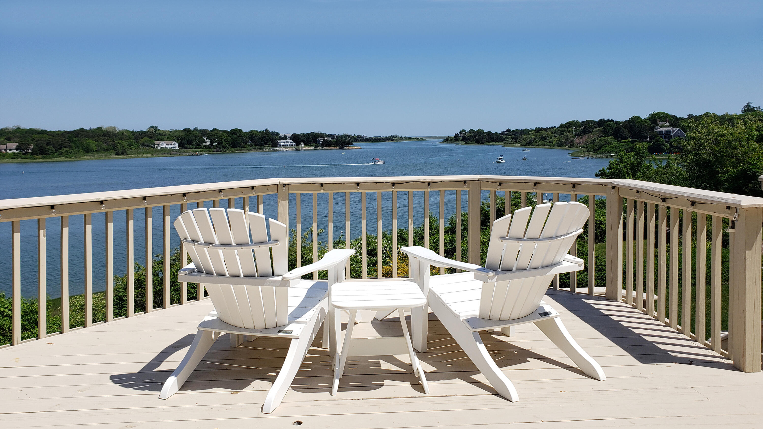 a view of a chairs and table on the terrace