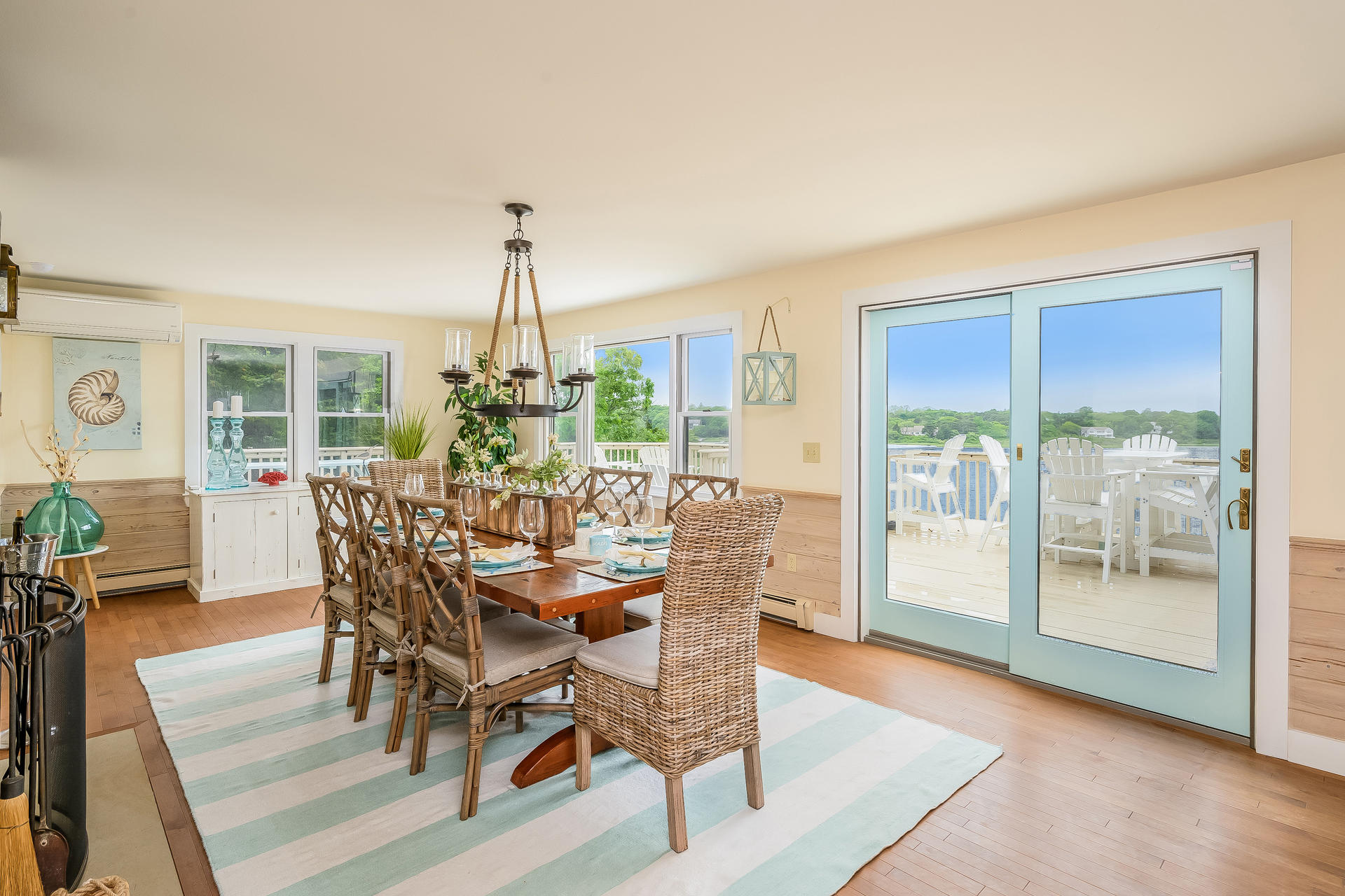 33 Ruggles Road Orleans, MA 02653 - Photo 12 of 80 a view of a dining room with furniture window and wooden floor