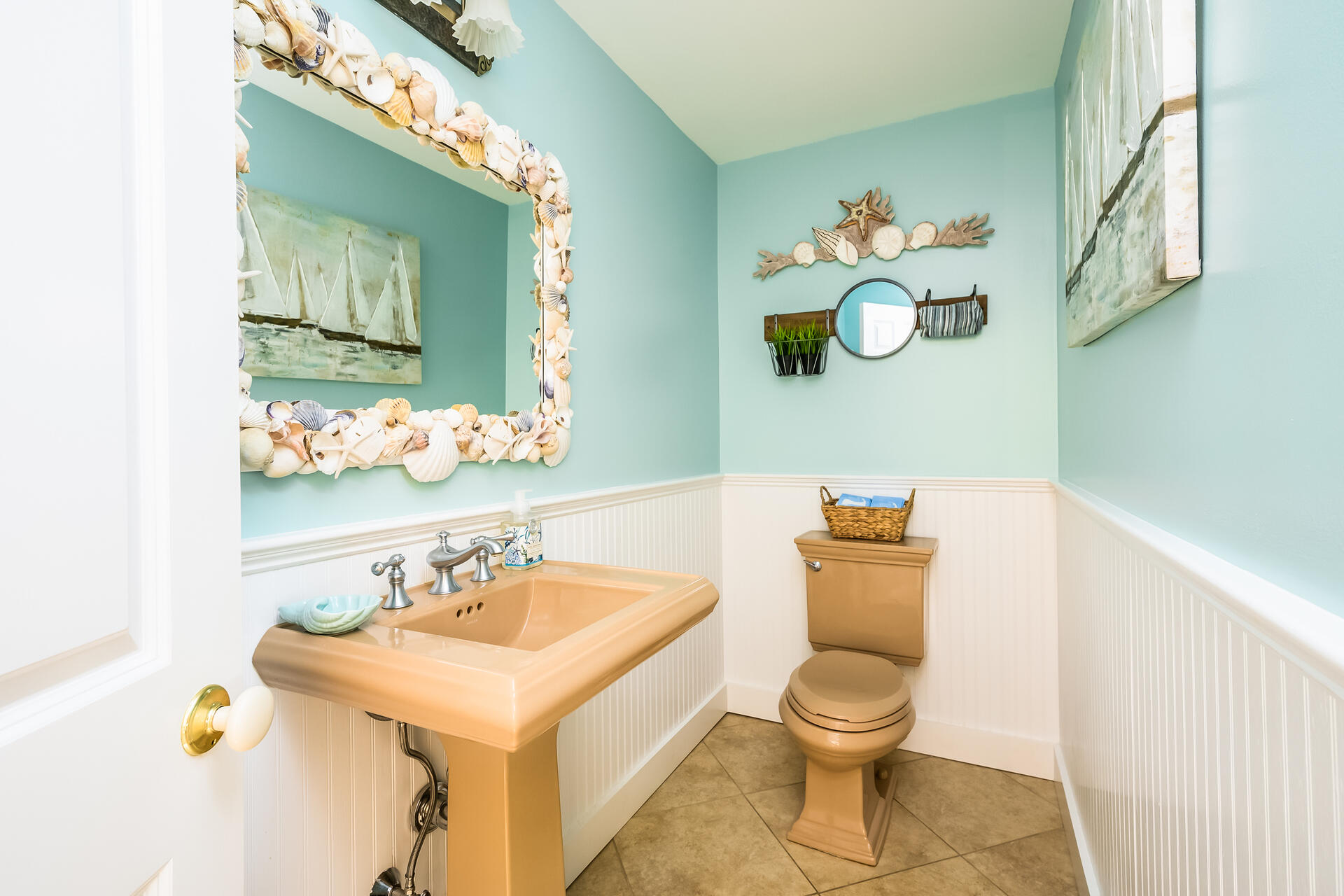 33 Ruggles Road Orleans, MA 02653 - Photo 25 of 80 a bathroom with a sink a toilet and a mirror