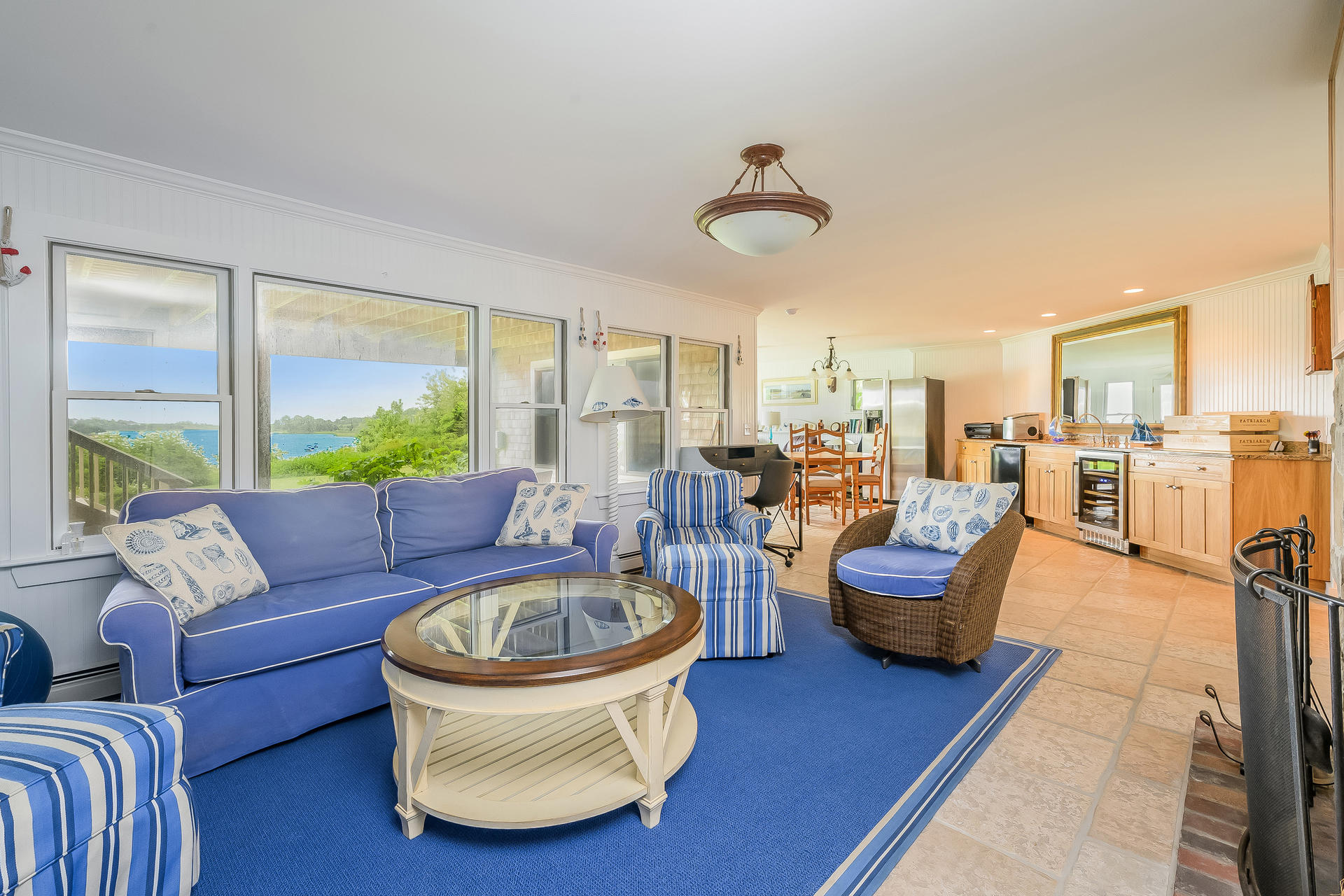 33 Ruggles Road Orleans, MA 02653 - Photo 40 of 80 a living room with furniture and a large window