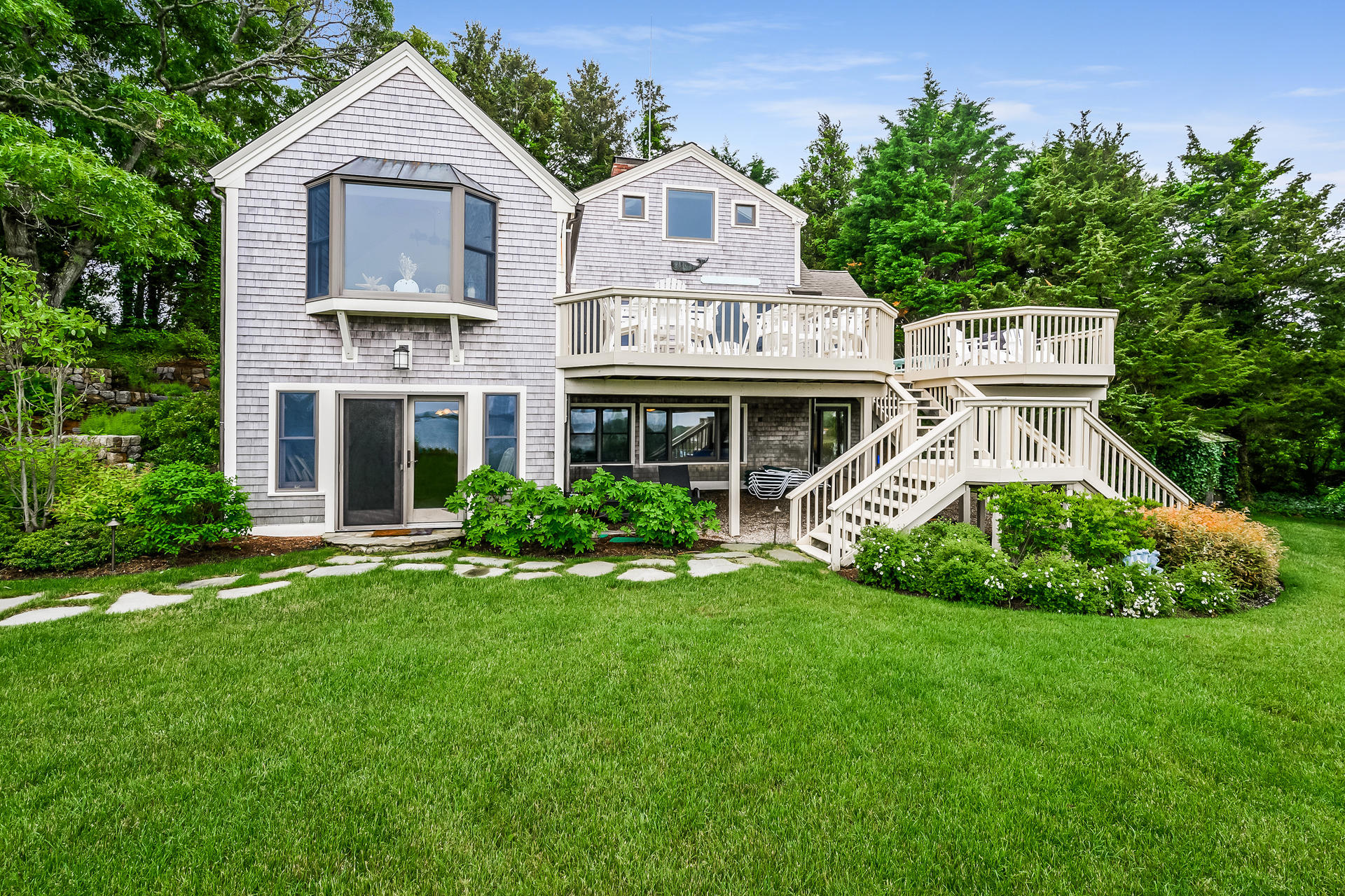 33 Ruggles Road Orleans, MA 02653 - Photo 50 of 80 a front view of a house with a yard